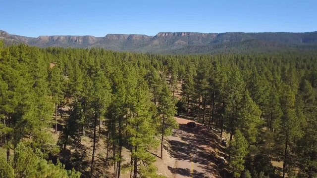 aerial view following a curvy mountain road in Arizona
