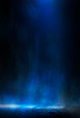 Empty street scene background with abstract spotlights light. Night view of street light reflected on water. Rays through the fog. Smoke, fog, wet asphalt with reflection of lights. 