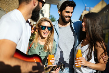 Group of friends having fun and spending good time together