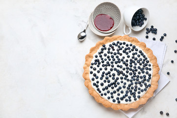 Fototapeta na wymiar Tasty bilberry pie on table