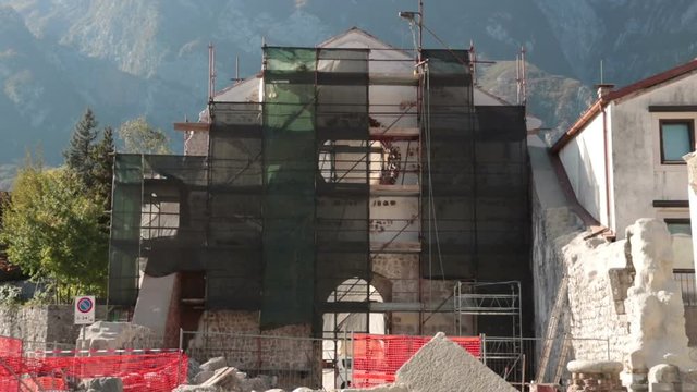 maintenance works on an ancient monument, protection of italian art heritage in Venzone