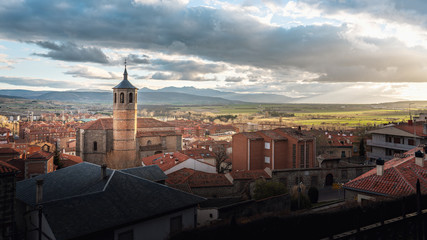 Fototapeta premium Aerial view of Avila at sunset with Santiago Church - Avila, Castile and Leon, Spain