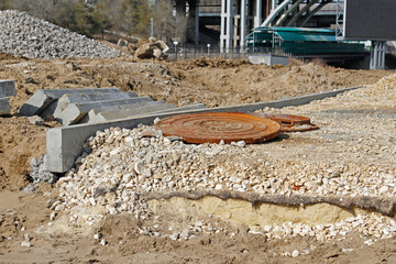 Construction of a manhole and road in the park