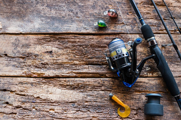 Kurgan, Russia-June 19, 2019 spinning and fishing lures on a wooden background with space for text