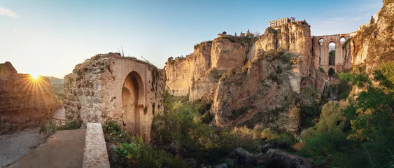 Wall murals Ronda Puente Nuevo Panoramic view of Ronda Puente Nuevo Bridge at sunset - Ronda, Malaga Province, Andalusia, Spain