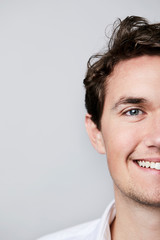 Naklejka premium Portrait of young man, smiling in close up