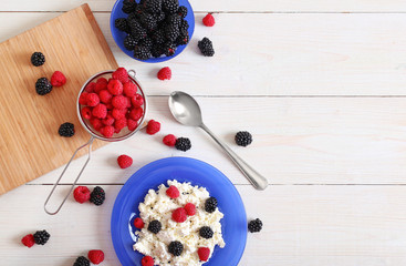 Cottage cheese and fruits on the table top view