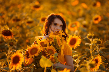 girl in a field of sunflowers