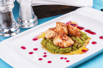  Mediterranean Chicken, on a pillow of pea puree with cranberry sauce