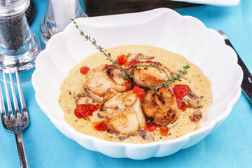 Mediterranean soup with seafood, crab meat, fish and chicken with creamy broth