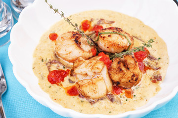 Mediterranean soup with seafood, crab meat, fish and chicken with creamy broth