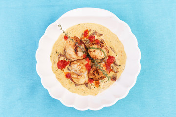 Mediterranean soup with seafood, crab meat, fish and chicken with creamy broth