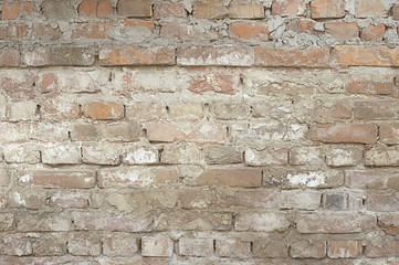 Old red brick wall with white paint background