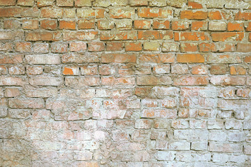 Old red brick wall with white paint background