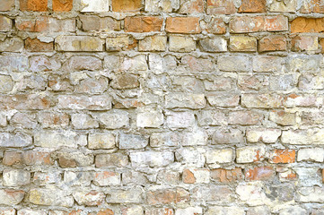 Old red brick wall with white paint background