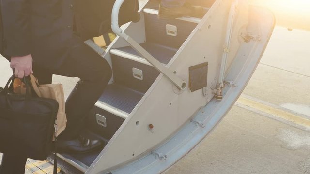 People boarding on jet in 4K slow motion 60fps