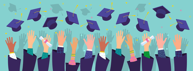 Concept of education. Graduates throwing graduation hats in the air.