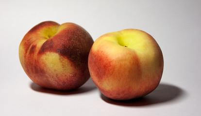 peach on white background from different sides
