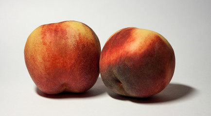 peach on white background from different sides