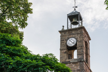 church tower with bell tower and clock