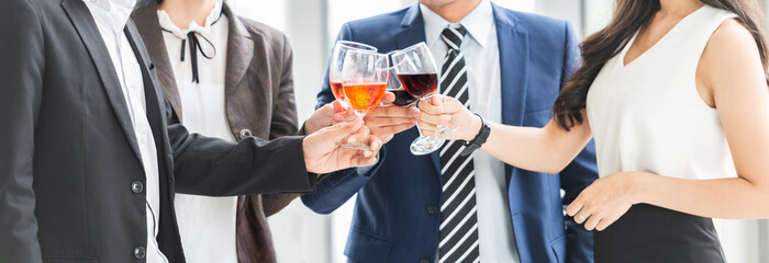 Celebration Toast with red wine after meeting.