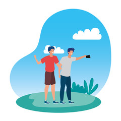 young men friends taking a selfie in the park