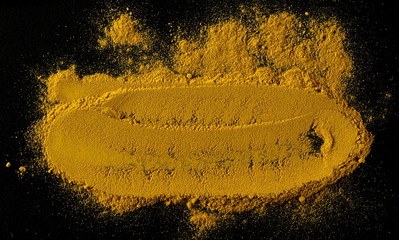 Turmeric powder isolated on black background and texture, top view