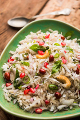 Dapde Pohe is a typical Maharashtrian breakfast, made with thin variety of poha and fresh coconut with chilli, peanuts and nuts. served in a bowl or plate. selective focus