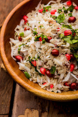 Dapde Pohe is a typical Maharashtrian breakfast, made with thin variety of poha and fresh coconut with chilli, peanuts and nuts. served in a bowl or plate. selective focus