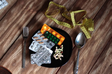 served dinner, and instead of food- pills, near the measuring tape