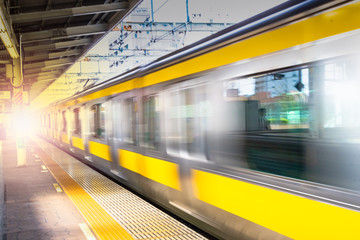 Subway station  Modern high speed passenger train on railroad in motion