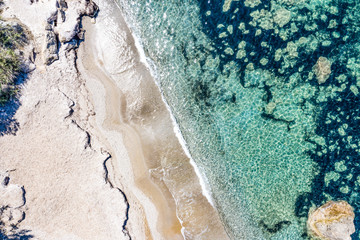 Fototapeta na wymiar Aerial view of beautiful rocky coastline with turquoise sea water..
