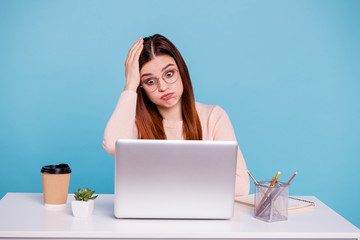 Close up photo beautiful she her foxy lady hand arm head sit desk table look notebook epic fail loser lot duties chores overwhelmed wear casual pastel warm pullover isolated bright blue background