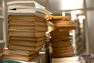 Blurred background. Library, books. Close-up.