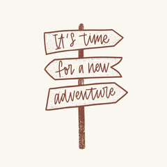 It's Time For A New Adventure inspirational phrase handwritten with elegant cursive font on signpost or guidepost © Good Studio