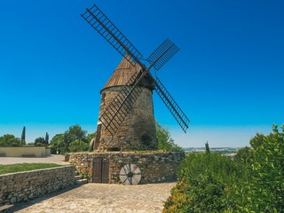 Plakat Mill in Castelnaudary in France, summer day, blue sky