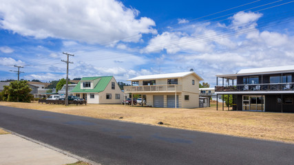 Fototapeta na wymiar road with houses in New Zealand