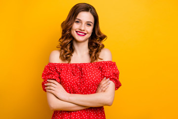 Pretty foxy lady hold arms crossed wear dress with open shoulders isolated yellow background