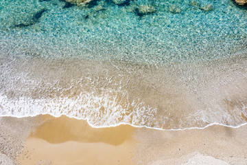 Fototapeta na wymiar Aerial view of beautiful rocky coastline with turquoise sea water..