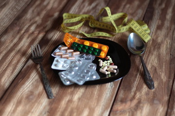 served dinner, and instead of food- pills, near the measuring tape