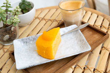 Orange cake in a ceramic dish