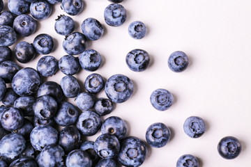 Perfectly ripe freshly picked local produce blueberries. Close up, copy space for text, top view, background. Healthy vegan snacks full of antioxidants. Seasonal summer berries.