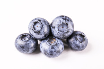 Perfectly ripe freshly picked local produce blueberries. Close up, copy space for text, top view, background. Healthy vegan snacks full of antioxidants. Seasonal summer berries.