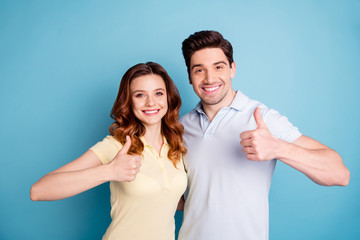 Photo of pair foxy curly lady brunet guy raise hands thumbs up advise product buyer wear casual...