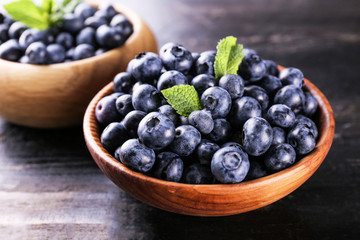 Perfectly ripe freshly picked local produce blueberries. Close up, copy space for text, top view, background. Healthy vegan snacks full of antioxidants. Seasonal summer berries.