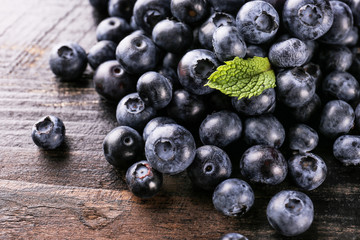 Perfectly ripe freshly picked local produce blueberries. Close up, copy space for text, top view, background. Healthy vegan snacks full of antioxidants. Seasonal summer berries.