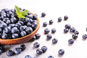 Perfectly ripe freshly picked local produce blueberries. Close up, copy space for text, top view, background. Healthy vegan snacks full of antioxidants. Seasonal summer berries.