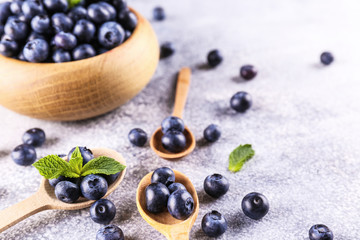 Perfectly ripe freshly picked local produce blueberries. Close up, copy space for text, top view, background. Healthy vegan snacks full of antioxidants. Seasonal summer berries.