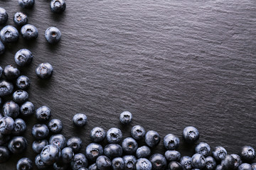 Perfectly ripe freshly picked local produce blueberries. Close up, copy space for text, top view, background. Healthy vegan snacks full of antioxidants. Seasonal summer berries.