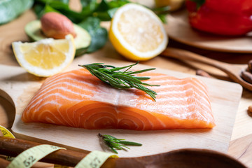 Selection of healthy food for heart on wooden background